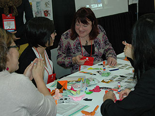 Conference attendees talking at table