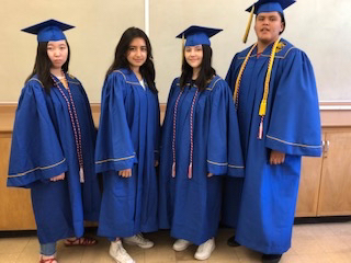 JNHS students in cap and gowns